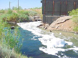 Raw sewage and industrial waste flows across international borders New River passes from Mexicali to Calexico, California